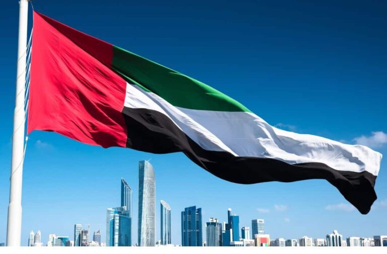 علم الإمارات وتظهر في الخلفية العاصمة أبوظبي